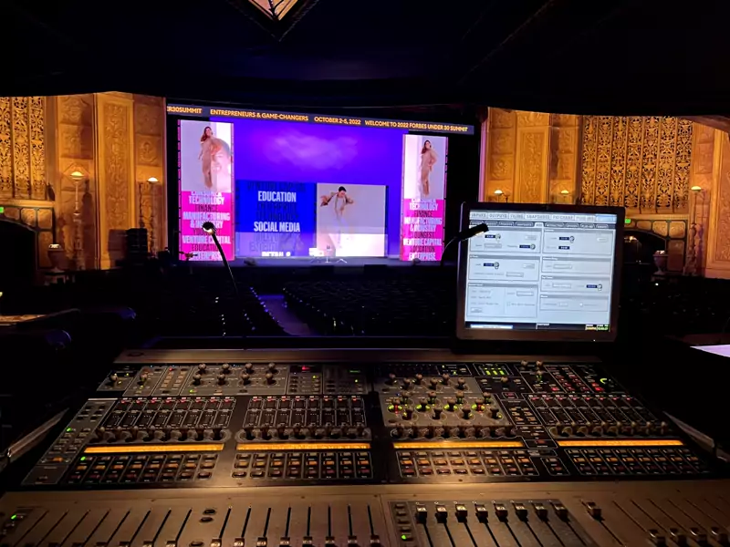 SR Audio mixing console set up in a theater