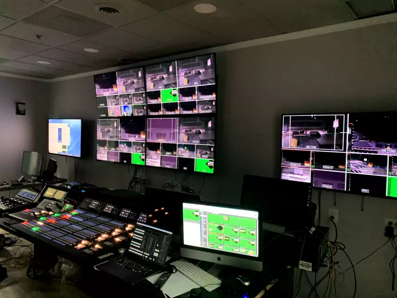 Video control room with monitors and switchers